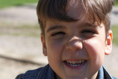 Close-up portrait of smiling boy