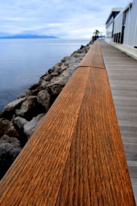 Pier on sea against sky