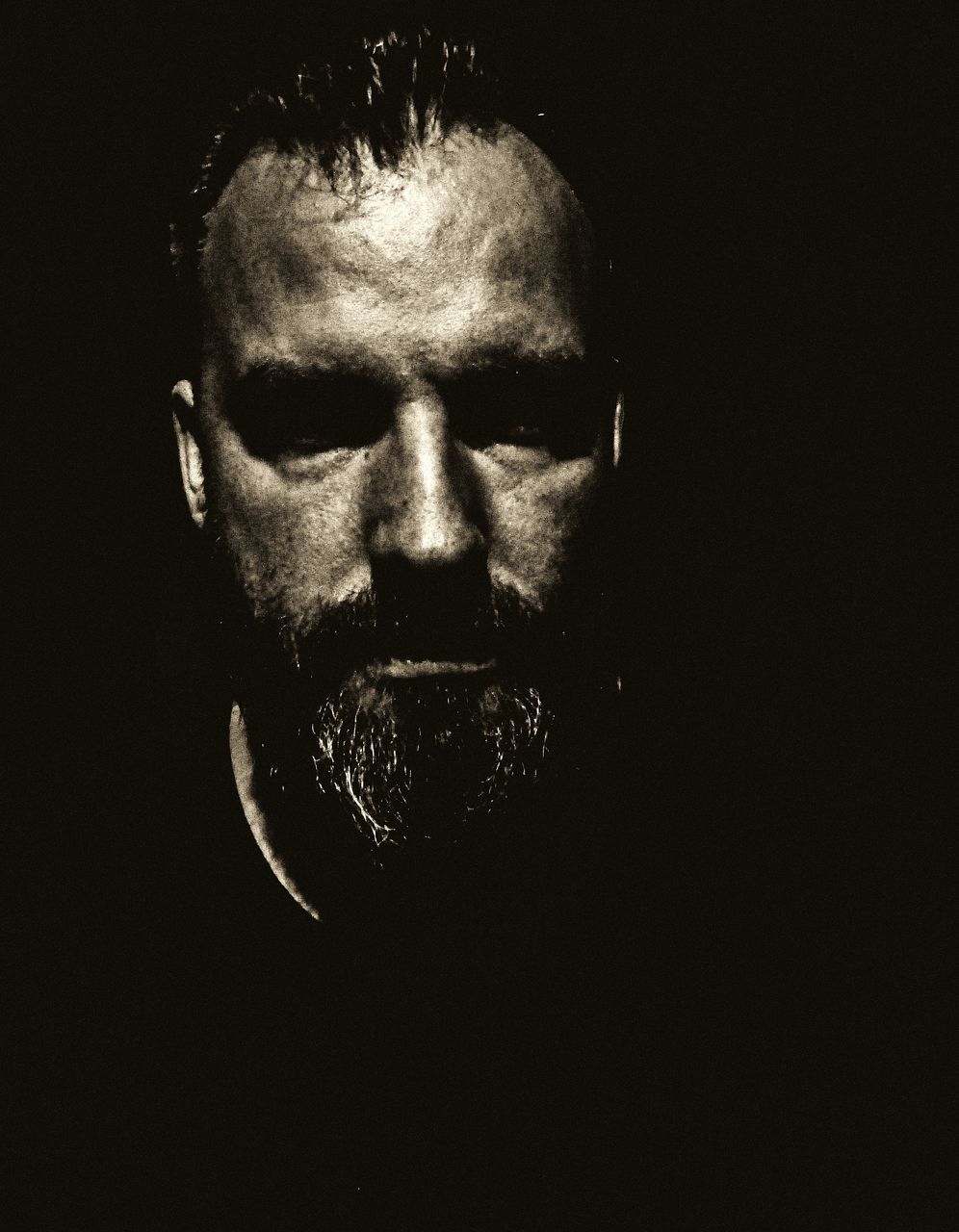 portrait, one person, headshot, studio shot, indoors, men, mid adult men, black background, males, copy space, close-up, mid adult, beard, human body part, looking at camera, front view, young men, facial hair, serious, human face, body part, dark, mature men, contemplation