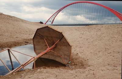 Abandoned parasol at beach