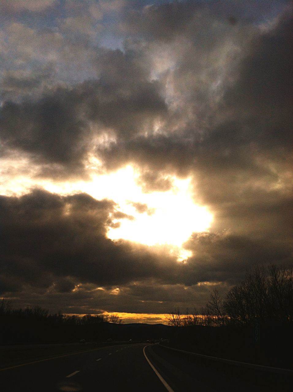 sky, cloud - sky, sunset, road, the way forward, cloudy, landscape, tranquil scene, scenics, transportation, tranquility, dramatic sky, beauty in nature, nature, diminishing perspective, cloud, overcast, weather, country road, vanishing point