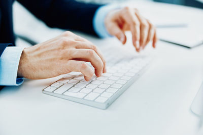 Man using laptop on table