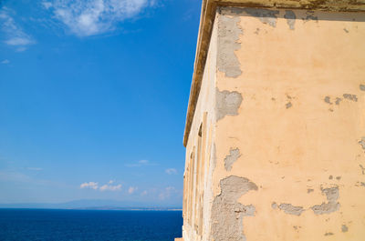 Scenic view of sea against blue sky