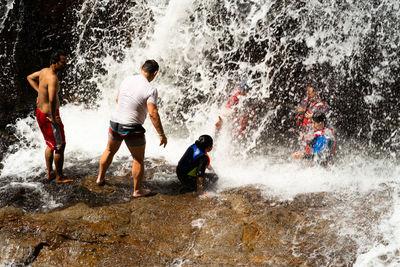 People enjoying in sea