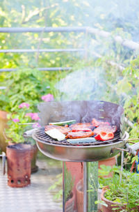 High angle view of meat on barbecue grill