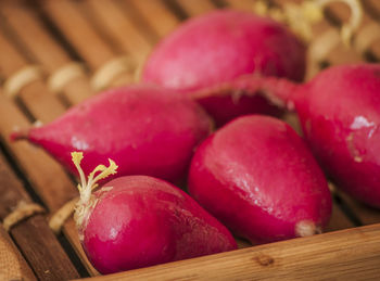 High angle view of radish in wooden tray