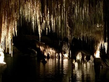 Silhouette people in cave