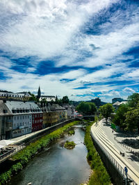 High angle view of river passing through city