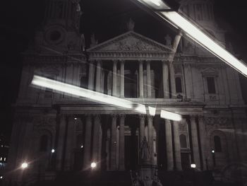 Low angle view of illuminated building at night