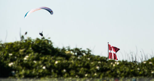 Low angle view of flag against clear sky