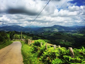 Country road passing through landscape