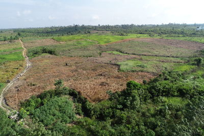 Scenic view of land against sky