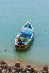 High angle view of ship moored on sea