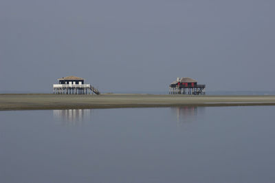 Calm sea against clear sky