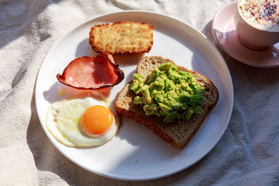 High angle view of breakfast served on table