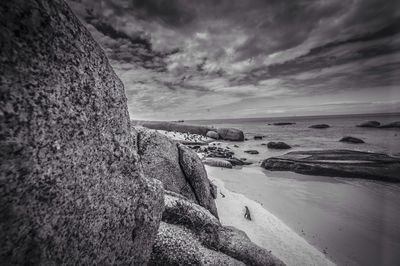 Scenic view of sea against cloudy sky