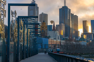 Modern buildings in city against sky