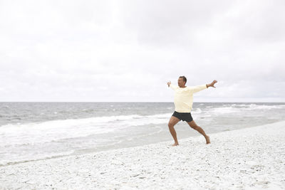 Man on sandy beach