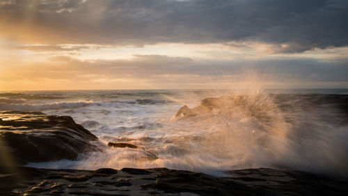 Scenic view of sea against sky during sunset