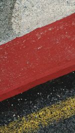 Close-up of red umbrella against the sky
