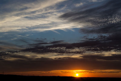 Low angle view of dramatic sky during sunset