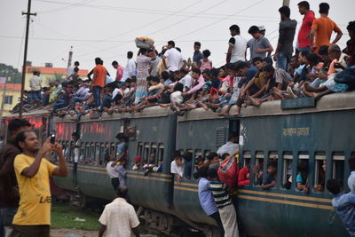 People on train against sky