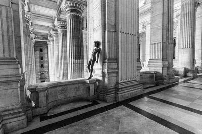 Woman in corridor of building