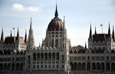 Buildings in city against sky