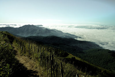 Scenic view of snowcapped mountains against sky