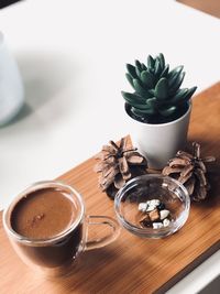 High angle view of coffee served on table