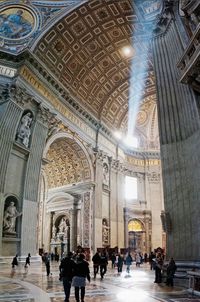Group of people in front of historic building