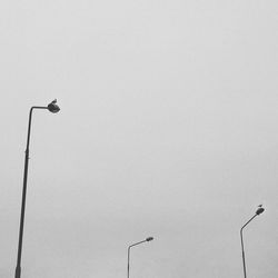 Low angle view of street light against clear sky