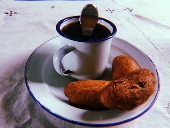 Close-up of coffee served on table