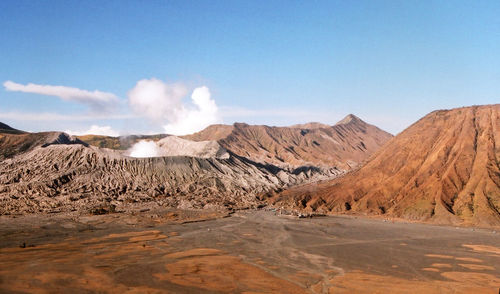 Panoramic view of volcanic landscape against sky