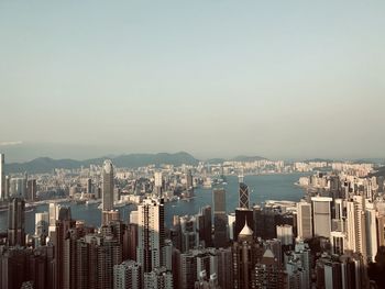 Aerial view of city buildings against sky