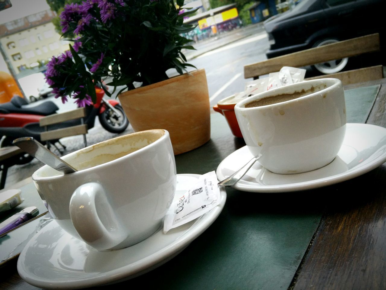 table, indoors, coffee cup, still life, food and drink, drink, high angle view, plate, saucer, coffee - drink, chair, cup, refreshment, freshness, close-up, book, coffee, no people, absence, restaurant