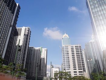 Low angle view of skyscrapers against sky