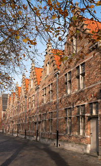 Street amidst buildings against sky