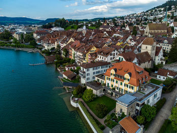 Amazing view of the swiss village during the sunset from drone.