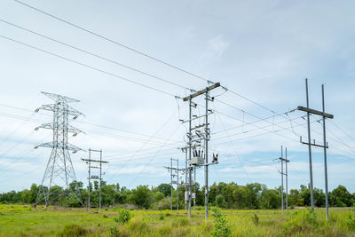 Electricity pylons on countryside landscape