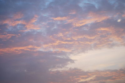 Low angle view of clouds in sky during sunset