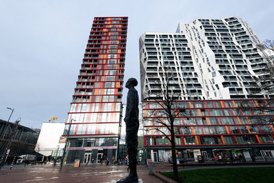 Low angle view of skyscrapers against sky