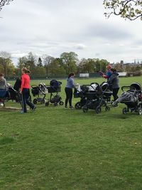 People on field against sky