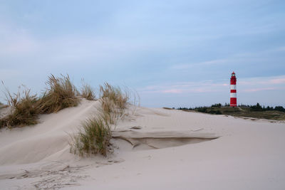 Panoramic image of the wittduen lighthouse at sunset, amrum, germany