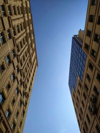 Low angle view of buildings against clear sky