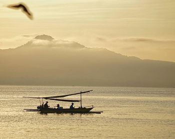 Scenic view of sea at sunset