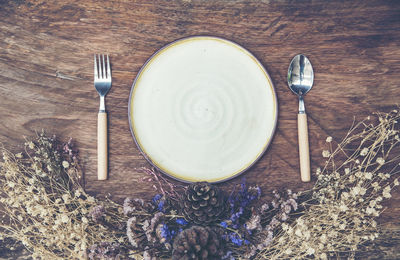 High angle view of coffee beans in glass on table