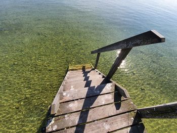 High angle view of ladder by lake