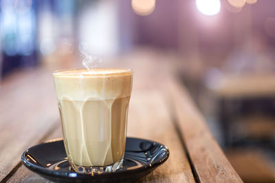 Close-up of coffee cup on table