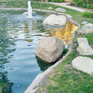 Reflection of rocks in lake